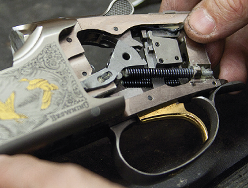 What is meant by the term 'hardening' on a shotgun?
